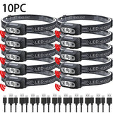Pack de dix mini lampes frontales LED noires avec capteur et câbles de charge USB