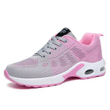 Chaussures de sport roses et grises pour femmes avec maille respirante et semelle amortissante