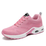 Chaussures de sport roses et grises pour femmes avec maille respirante et semelle amortissante