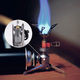 Adaptateur de gaz extérieur en utilisation, flamme bleue pour réchaud de camping