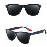 Lunettes de soleil polarisées noires avec monture bleue et embouts rouges