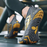 Chaussures pieds nus noires et dorées, semelle en gomme résistante