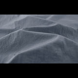 Détail du tissu de la veste de randonnée imperméable, conception plissée pour une meilleure flexibilité