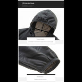 Détails de la capuche et des manches de la veste noire, design fonctionnel et confortable