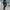 Homme portant un pantalon gris d'été grande taille, matériau extensible