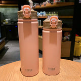 Deux bouteilles isothermes roses TYESO de tailles différentes