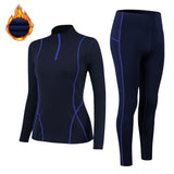 Ensemble bleu foncé de sous-vêtements thermiques pour femmes avec coutures bleues, parfait pour le ski