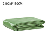 Couverture de survie verte de 210cm x 130cm, pliée