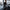 Homme portant un t-shirt de compression noir dans une salle de sport, entraînement, fitness