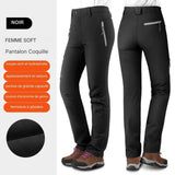 Pantalon de trekking imperméable noir pour femme, coupe-vent, avec poches zippées et intérieur en velours chaud et doux.