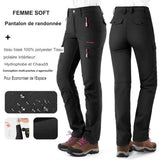 Pantalon de randonnée gris pour femme, tissu hydrophobe et coupe-vent, coutures renforcées, poches spacieuses et intérieur polaire.