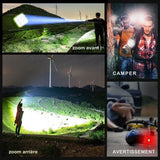 Lampe de poche LED XHP100 utilisée en camping et randonnée avec zoom avant et arrière
