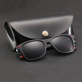Lunettes de soleil polarisées noires avec étui en cuir noir