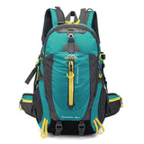 Sac à dos vert foncé de randonnée 40 L, avec poches multiples et fermeture éclair jaune