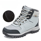 Bottes de neige grises en cuir pour femme, détails peluche et couture renforcée