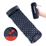 Matelas de camping noir avec pompe à air intégrée et sac de transport compact