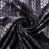 Motif en spirale sur tissu de sous-vêtements de compression camouflage gris, vue rapprochée
