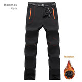 Pantalon homme noir chaud et coupe-vent avec poches zippées orange et molleton visible