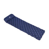 Matelas de camping gonflable bleu marine avec coussin intégré, offrant un confort supérieur pour les campeurs
