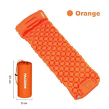 Matelas de camping orange avec oreiller intégré et sac de transport compact