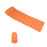 Matelas de camping gonflable orange avec coussin intégré et pompe de gonflage, léger et compact pour les aventures en plein air