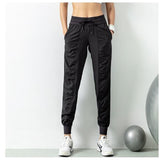 Pantalon de jogging noir pour femme, parfait pour le sport et le fitness, avec poches latérales