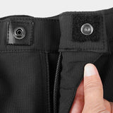 Pantalon de randonnée pour femme avec multiples poches sécurisées et fermeture YKK.