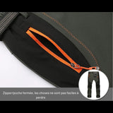 Poche zippée du pantalon de trekking femme, fermeture sécurisée avec tirette orange