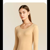 Sous-vêtement thermique beige pour femme, manches longues, vue de trois-quarts