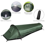 Tente de camping verte avec caractéristiques en médaillons, fond imperméable, maillage respirant, sac de rangement portable
