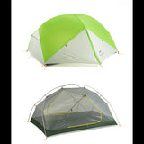 Tente de camping verte et grise montrant la structure interne et externe