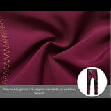 Tissu bordeaux haut de gamme du pantalon, doux, respirant et résistant aux frottements