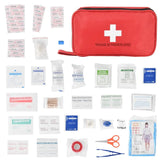 Trousse de premiers soins rouge avec bandages, compresses et accessoires médicaux