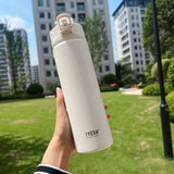 Gourde thermos isotherme blanche TYESO avec bouchon sécurisé