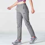 Pantalon de randonnée pour femmes, couleur grise, taille élastique, poches zippées