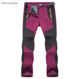 Pantalon polaire femme rouge pour randonnée hivernale avec renforts aux genoux
